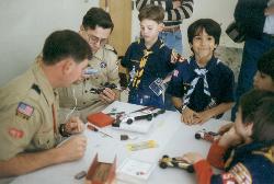 Robert waiting to weight-in Pinewood Derby 1997